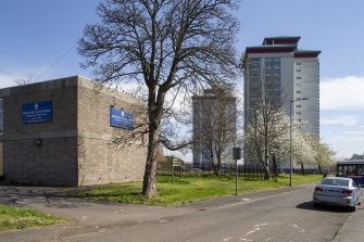 View of signage and tower blocks from southeast from Montgomery Road