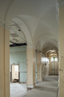 Ground floor. General view of entrance hall and vaulted corridor looking west