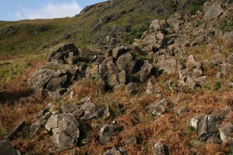 General view of the scree slope where the rock shelter and midden are located.