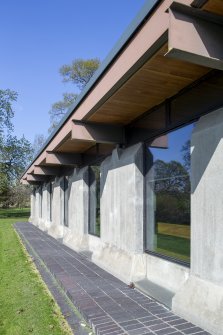 Detail of concrete pier and over-sailing roof 