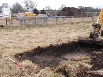 Photograph: North end of trench with Tr 23, 22 background, Trench 24,  Facing ESE, Maidencraig, Aberdeenshire 
