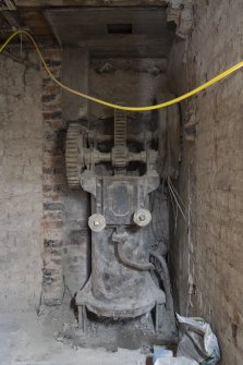Interior. Sub-basement onto North Frederick Street. View of hydraulic control valve lit by ambient light.