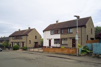 View from north-west showing pair of semi-detached houses at Nos 13-19 South Pilmuir Road, Clackmannan