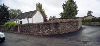 View from north-west showing No 33 High Street, Clackmannan, behind boundary wall