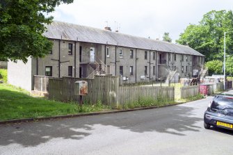 View from north-east showing external stairs to upper flats at Tower Place, Clackmannan