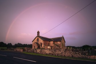 General view of church  featuring sunset rainbow