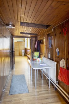 Entrance. View of corridor leading to church hall. 