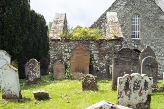 View of burial aisle attached to east gable from east