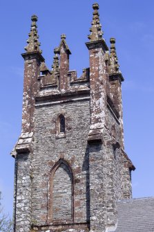 Detail of finials and blind window on tower