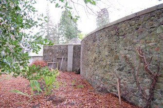 Photograph: Round section of garden wall F6, Facing  SE, Camera Point 86, Edgehill Cottage, 45 Culter House Road, Milltimber, Aberdeen
