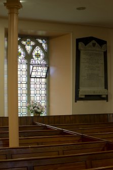 Detail of stained glass window and column.