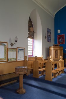 View of font, pews and pulpit