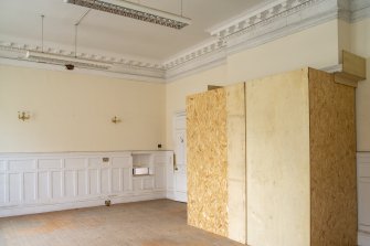 Ground floor. Dining room. General view with original 1916 fireplace boarded up. 