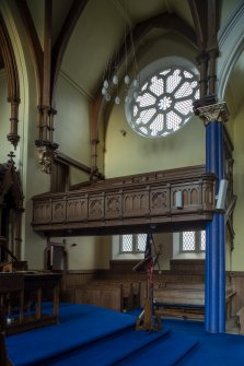 View of east transept and gallery from south west