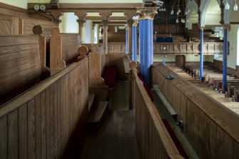 Detail of east transept gallery pews