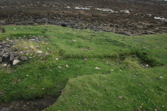 View from NW showing the outline of turf stripping