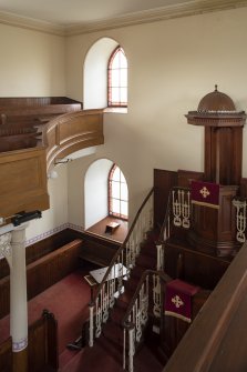 First floor.  View of gallery and pulpit, showing rising curvature of gallery front