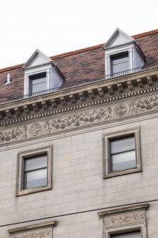 View of third and forth floor windows and frieze on south facade of 112 Princes Street, from south.