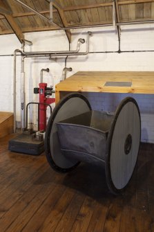 Interior. Brewhouse, Copper Firing area, 1st floor. View of Hop Chariot used to bring hops from the Hop Loft area adjacent. 