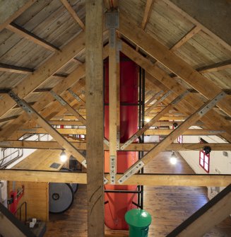 Interior. Brewhouse, 1st floor, Copper vessel area. View of roof truss - rebuilt after late 1990s fire.