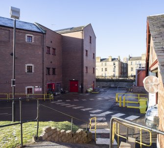 View  of main brewery (left), Kegging Hall (right) and railway line beyond from east.