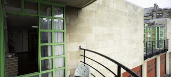First floor.  View of balcony showing window to Mess Room, from south.