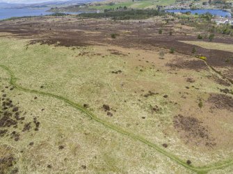 Oblique aerial view centred on the burial cairns