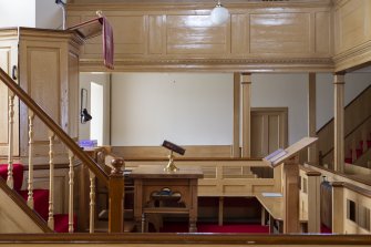 View to west showing pulpit, lectern, font and communion table