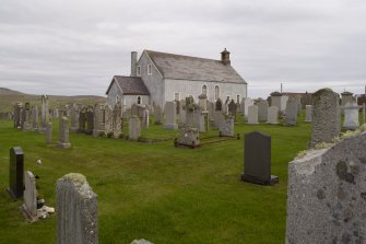 General view from south west showing setting within graveyard