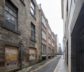 View west along Bothwell Lane
showing rear of building