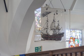 Detail of hanging ship model above entrance to Sailor's Aisle