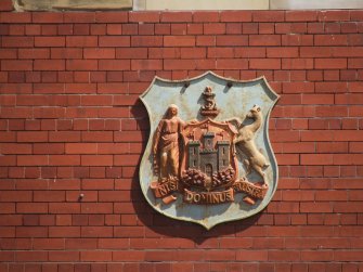 Site photograph, Station building crest, Granton Gasworks, Edinburgh, Scotland