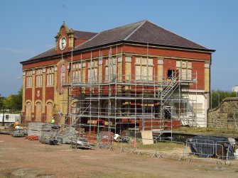 Site photograph, Station building with South elevation fire escape removed and scaffolding, Granton Gasworks, Edinburgh, Scotland