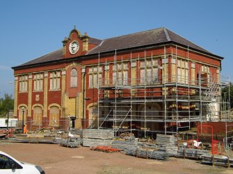 Site photograph, Station building with South elevation fire escape removed and scaffolding, Granton Gasworks, Edinburgh, Scotland