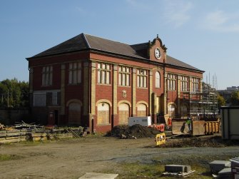 Site photograph, Station building with South elevation fire escape removed and scaffolding, Granton Gasworks, Edinburgh, Scotland