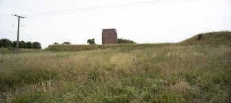 View from east of WW1 Nitroglycerine Hill No.1 Brine Tank Base and WW2 blast mound adjacent