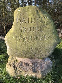 View looking SW showing the engraved face of the Dairsie House, Woodend marker. 