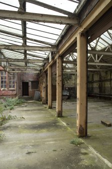 Courtyard View of south range looking east showing glazed roof structure.