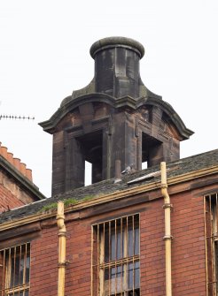 View of elaborated ventilation flue on west gable of north range