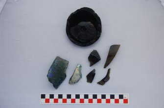 Watching Brief photograph, Green glass sherds from Trench 1 - front, 17-19 High Street, Fraserburgh