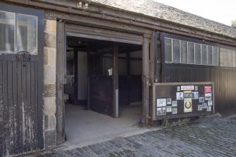Pollock House Stables.  View of entrance to stables from north.