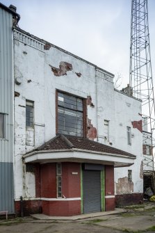 Detail from north north west of 1930's two-storey section with brick work and Crittall window.