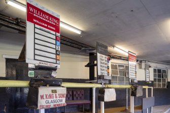 Detail of bookmakers area showing boards with 'bookies' bags.