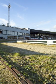 Low level image showing channel holding wire for the 'hare' with main stand in the background.