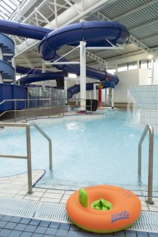 Xcite Livingston Leisure Centre.  View of pool area with flume in background.