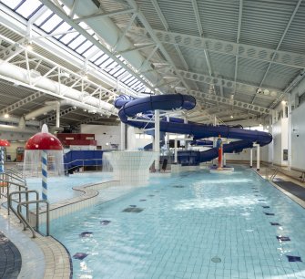 Xcite Livingston Leisure Centre.  View of pool area with flume in background.