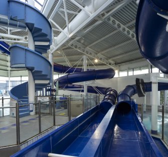 Xcite Livingston Leisure Centre.  View of flumes with entry staircase.