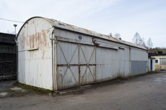 Carsfad Hydro Electric Power Station. Corrugated workshop with Belfast Roof profile at NX 60505 85513