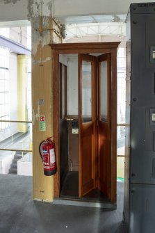 Carsfad Hydro Electric Power Station, Turbine House. Interior. View of original telephone call box.