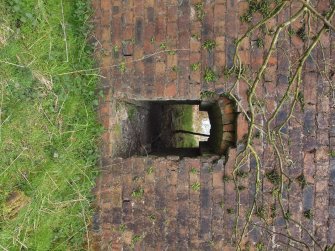 View of the small aperture near the foot of the chimney from the north west